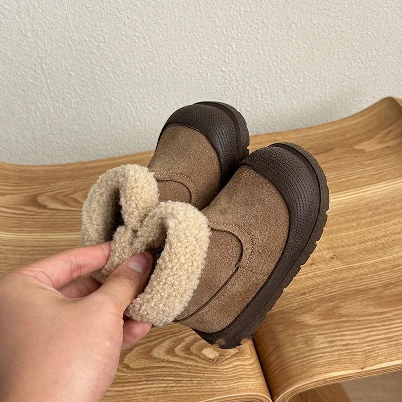 Brown baby winter ankle boots with beige plush fleece lining and dark textured soles