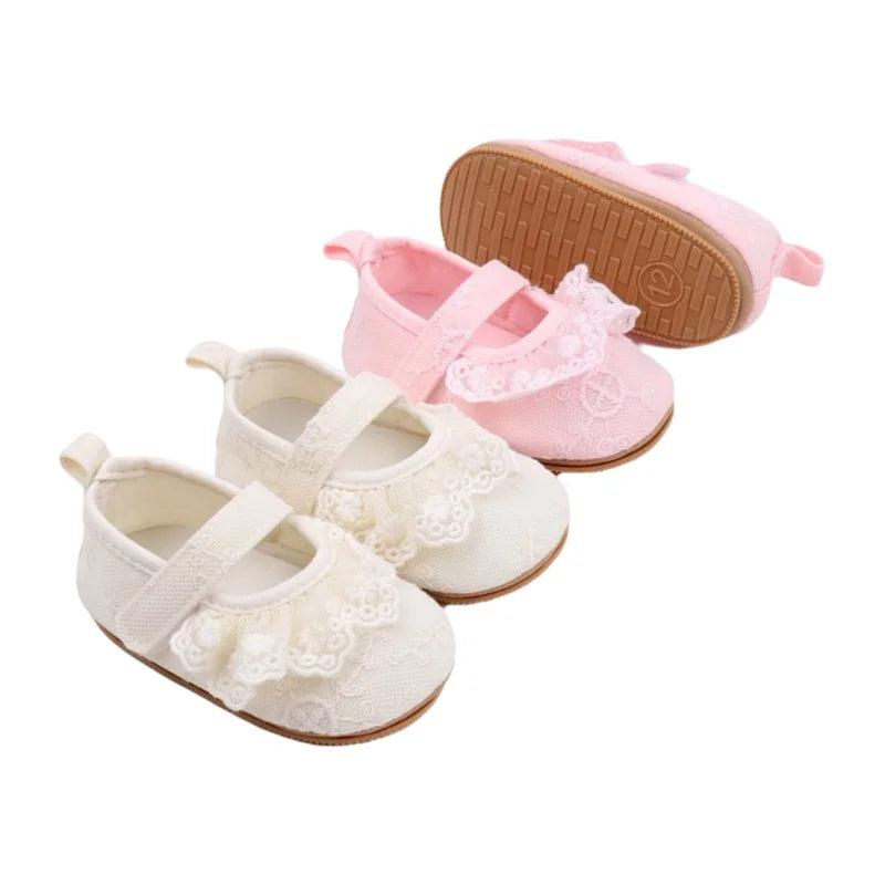 Baby girl lace Mary Jane shoes with floral ruffle detailing in pink and ivory white