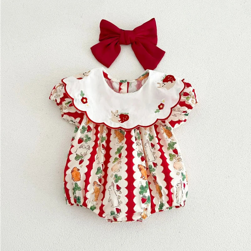 Baby girl Christmas bubble romper with vintage bunny print, white embroidered scalloped collar and matching red bow